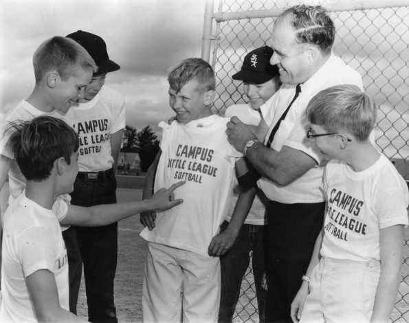 [Campus Little Leaguers at Andrews University try on new sports t-shirts]