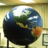 [Missionary Globe and J.N. Andrews trunk in the Andrews University Heritage Room]