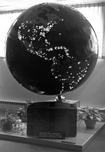 [Missionary globe with J.N. Andrews trunk in the Andrews University Heritage Room]