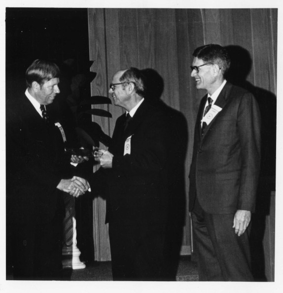 [Richard L. Hammill and Wilson Trickett awarding alumni at Andrews University Campus Pioneer Memorial Church, 1973].Richard Hammill