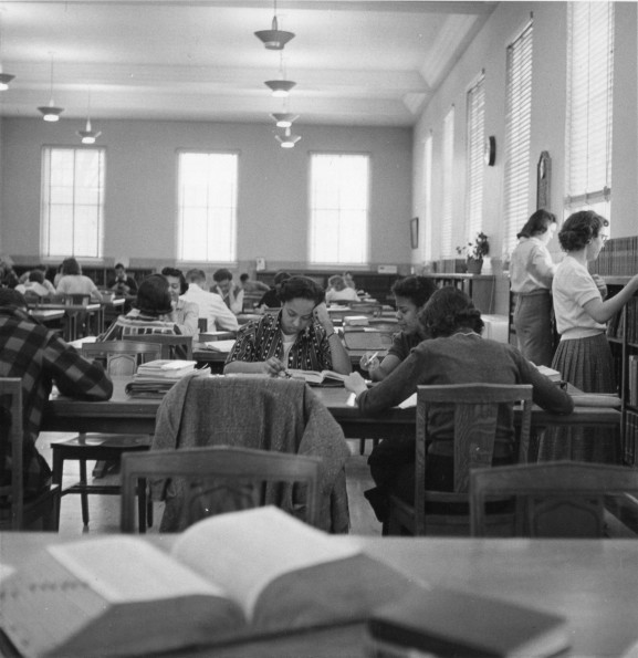 [Students studying in Emmanuel Missionary College library]