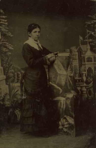 Unknown woman posing in a studio portrait