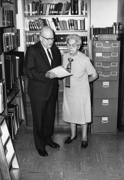 [Carrie Johnson with Arthur L. White in the White Estate vault]