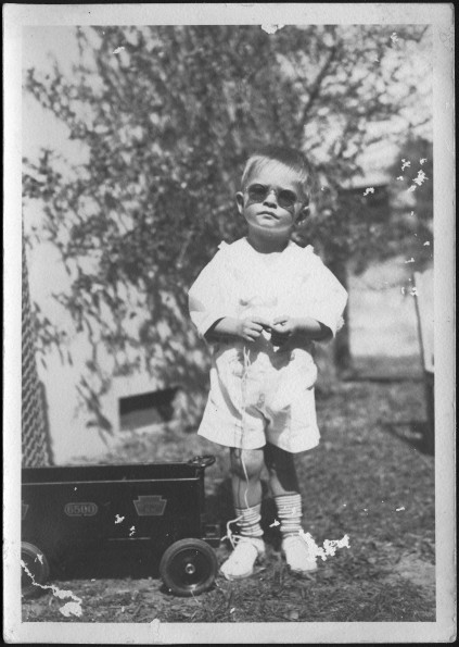 William Brunie wearing sunglasses with his wagon