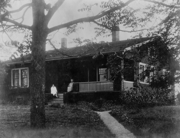 Two unknown women at one of the Teacher's Cottages at Madison College