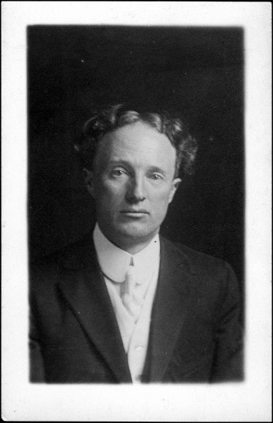 Max Hill in a studio portrait